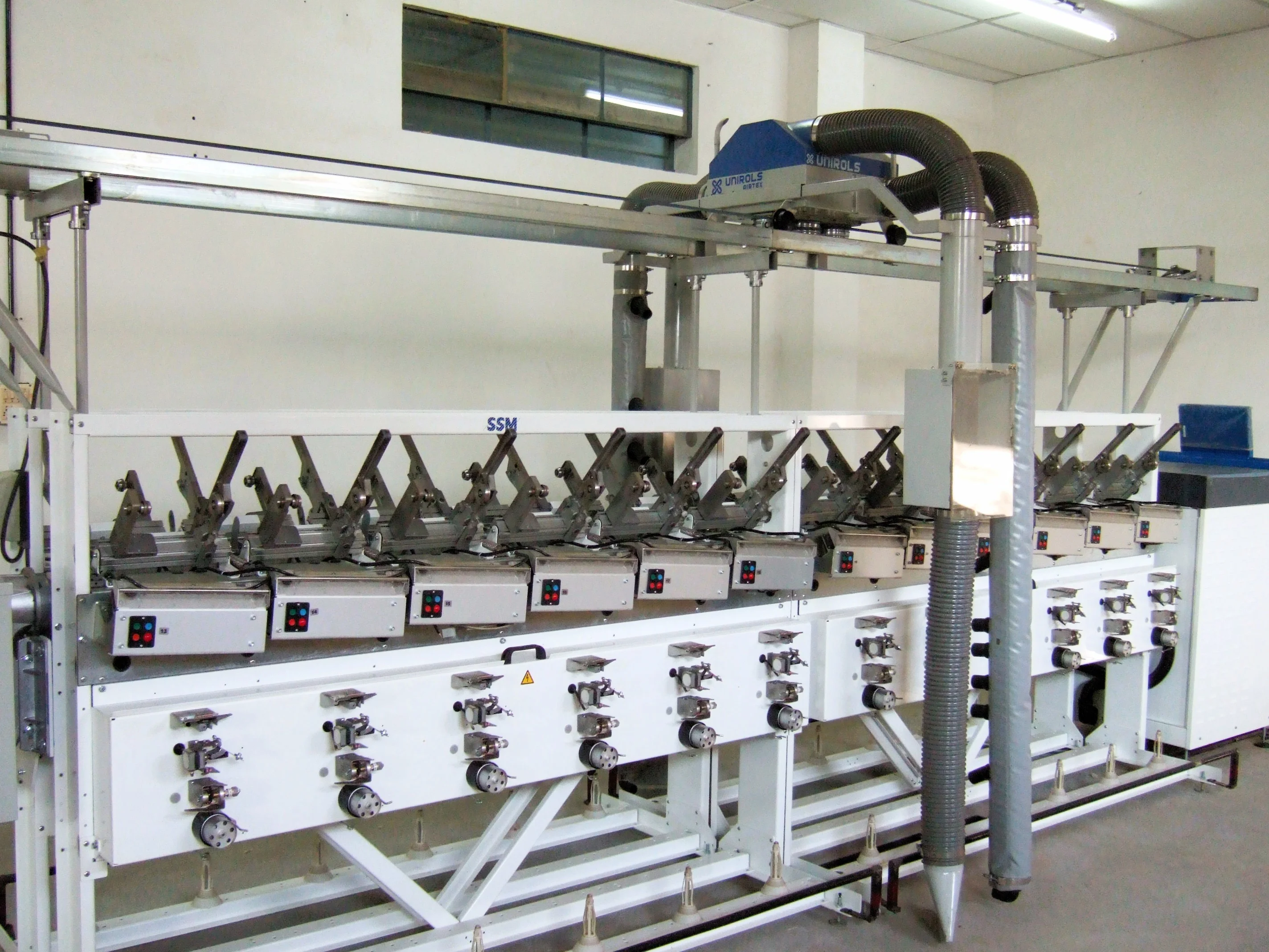 Overhead travelling cleaner - for spinning units - Belt driven travelling cleaner